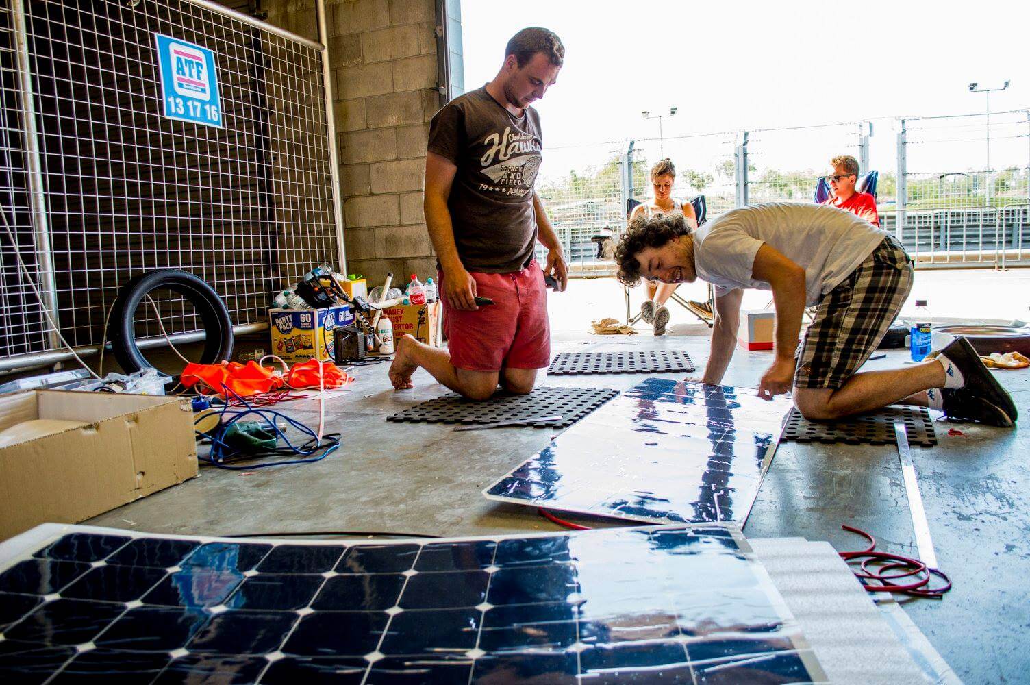 Installing flexible solar panels onto AURST world solar challenge entry