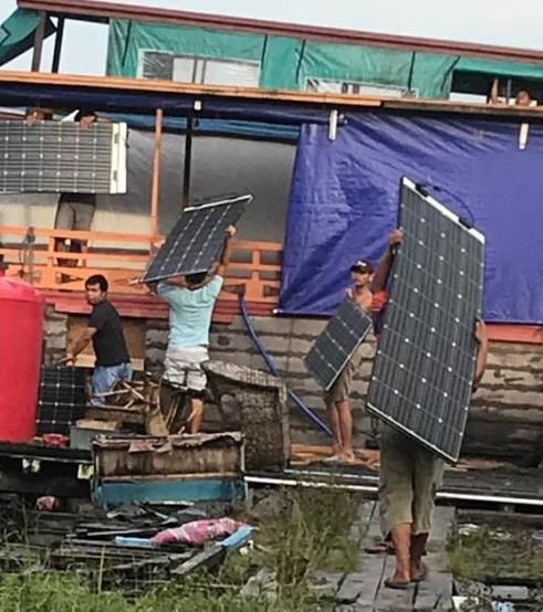eArche  lightweight solar panels getting installed on Borneo tourist boat