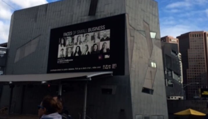 Faces of Small Business Exhibition on big screen at Federation Square Melbourne