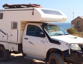 Motorhome with black solar panel on the front