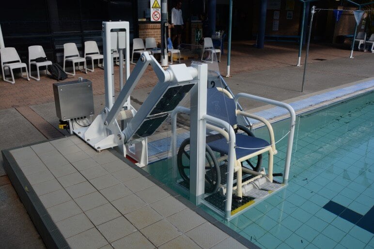 solar powered pool lift in action at Wollongong University swimming pool