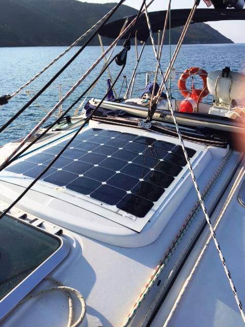 Solbian lightweight flexible solar panels on yacht beside hatch