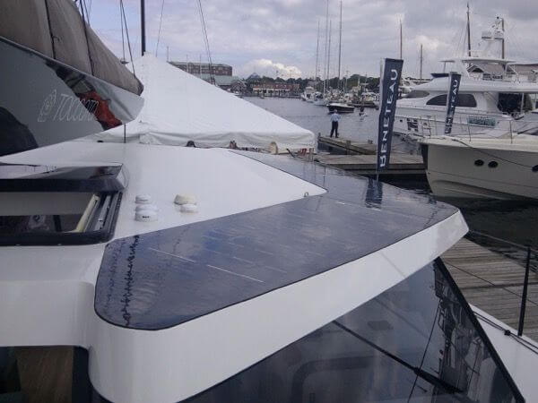 Catamaran with custom shaped Solbian flexible solar panels