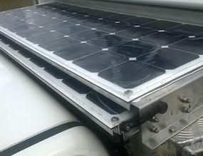 flexible solar panels on pullout tray on camper