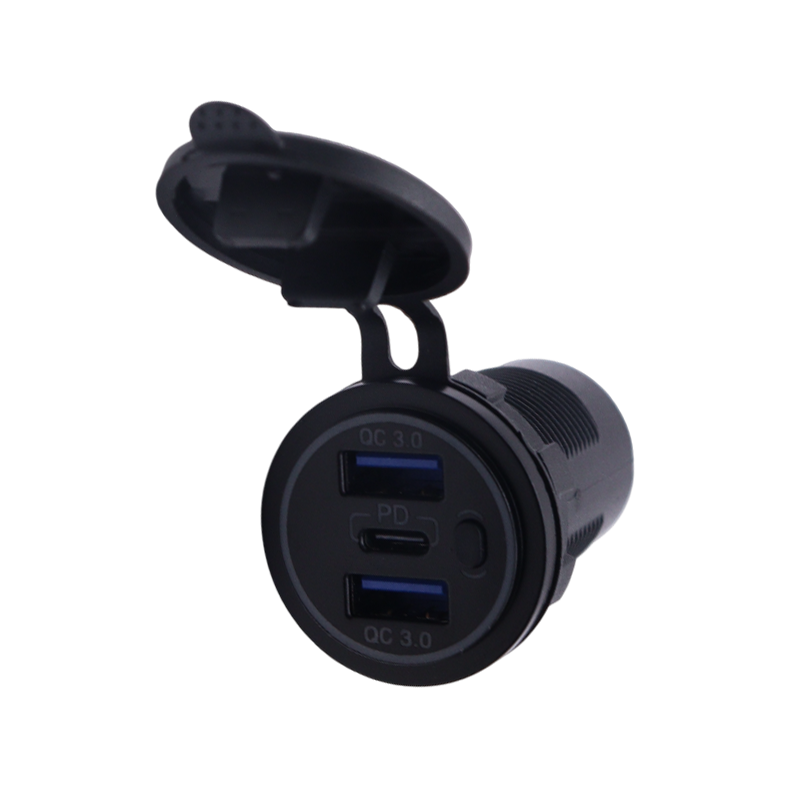 Angled view of USB socket face showing dual USB-A and single USB-C ports surrounded by a blue ring