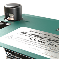Detailed view of the M8 battery terminal post and safety instructions on the top panel