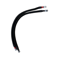 Pair of black corrugated battery cables with ring terminals