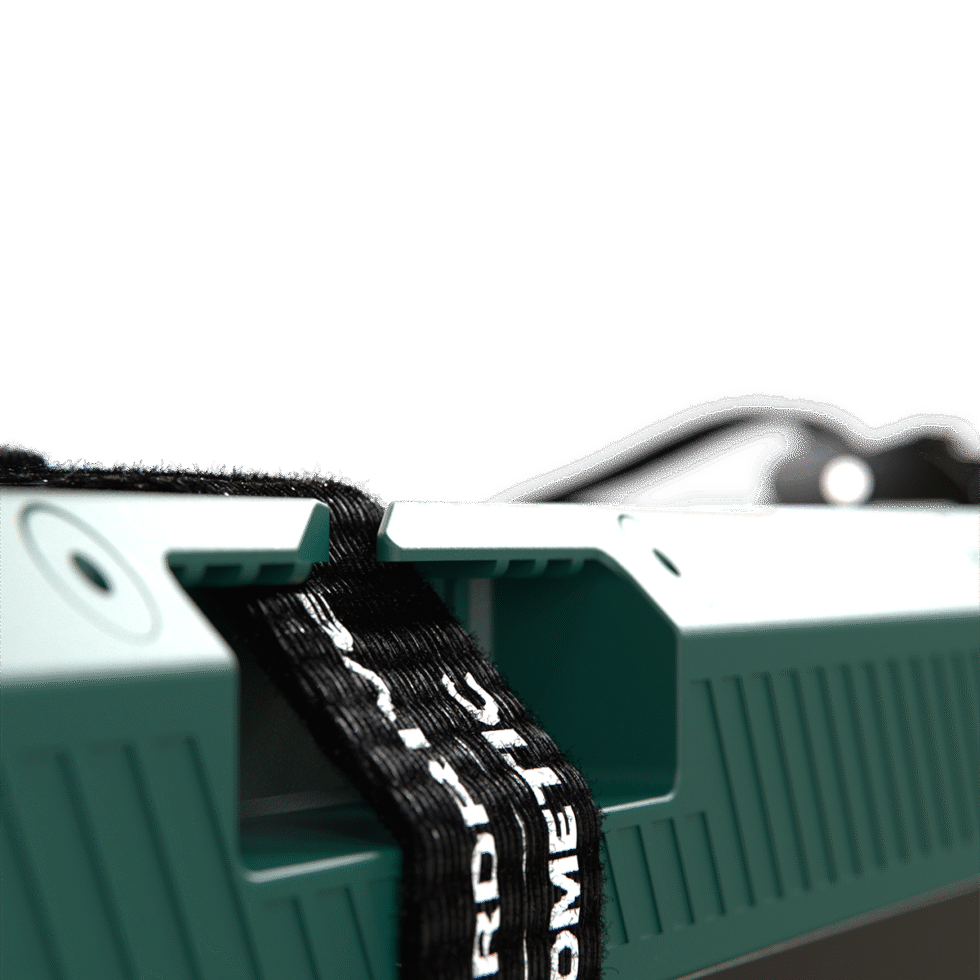 Detail of the integrated mounting strap slot on the battery casing