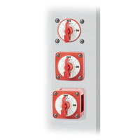 Three red battery switches shown in different mounting configurations on a panel