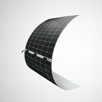 Large flexible solar panel curved into a semi-circle demonstrating high bendability