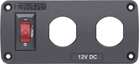 Front view of a Blue Sea 12V switch panel with one red circuit breaker and two circular blank positions