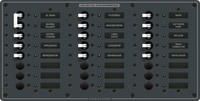 Front view of 22-position 230V AC marine distribution panel with grey finish and backlit toggle switches