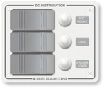 White Blue Sea 3-position marine DC distribution panel with grey rocker switches and waterproof circuit breaker boots