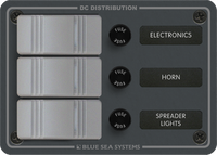 Slate grey Blue Sea 3-position DC switch panel with fused rocker switches and circuit labels