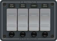 Front view of Blue Sea 4-position fused DC switch panel in slate grey with Contura switches