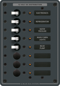 Blue Sea 8-position 12V DC distribution panel with 15A toggle circuit breakers and backlit labels