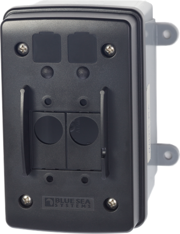 Surface mount circuit breaker enclosure with slots for A and C series toggles and LED indicators