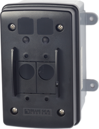 Surface mount circuit breaker enclosure with slots for A and C series toggles and LED indicators