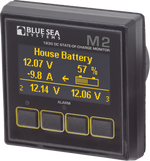 Blue Sea M2 OLED DC multimeter displaying voltage, current, and state-of-charge on a high-contrast screen