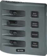 Gray 4-position waterproof 12V DC marine switch panel with toggle switches and labels