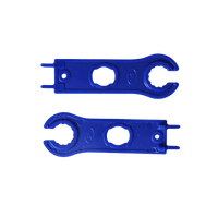 Flat lay of two blue plastic solar connector spanners showing wrench heads and unlocking prongs