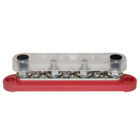Red busbar with clear protective cover installed over the terminals