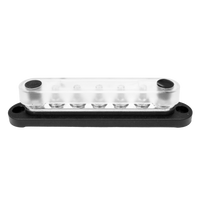 Side view of 7-stud busbar with clear polycarbonate cover installed