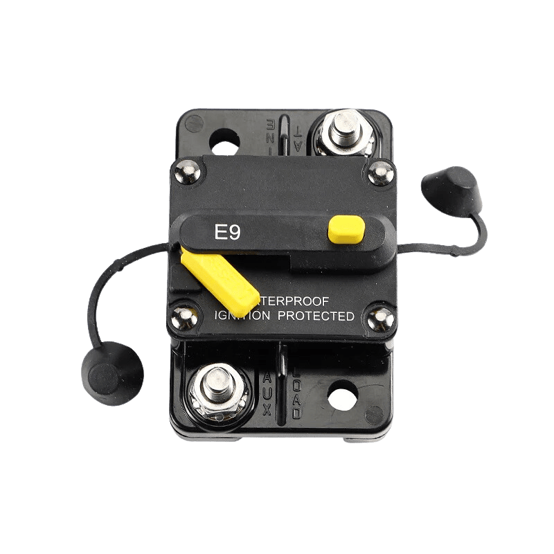 Close up of circuit breaker terminals with AUX and LOAD molded polarity markings