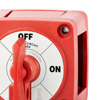 Close-up detail of the red polymer housing and mounting hole on the battery switch