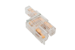 Clear 1-in 2-out AC power splitter showing internal brass terminals and transparent polycarbonate housing