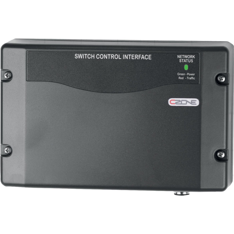 Front view of a CZone Switch Control Interface module with a green status LED and four mounting holes