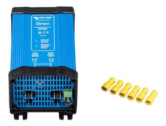 Angled view of Victron Orion DC-DC converter showing Faston connection tabs and included yellow terminals