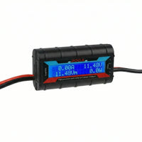 Close-up of the backlit LCD display showing voltage, current and power readings