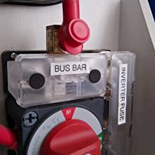 Electrical panel installation showing bus bar and battery switch in a marine or caravan context