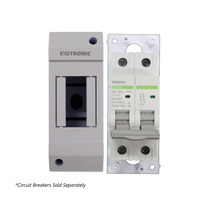 Exotronic 2-way enclosure displayed next to a compatible Noark 2-pole circuit breaker for size comparison