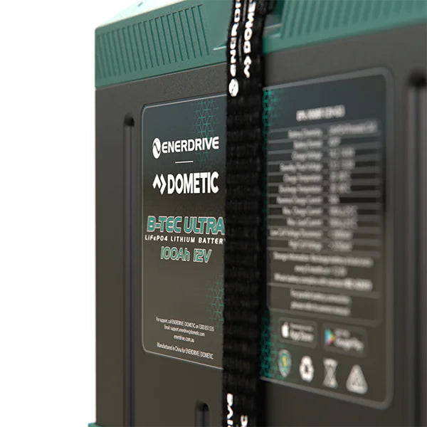 Close-up of the technical specification label and Enerdrive Dometic branding on the battery front