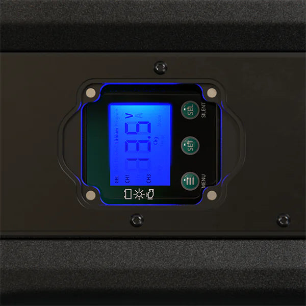 Close-up of ePRO+ battery monitor blue backlit LCD screen showing system metrics