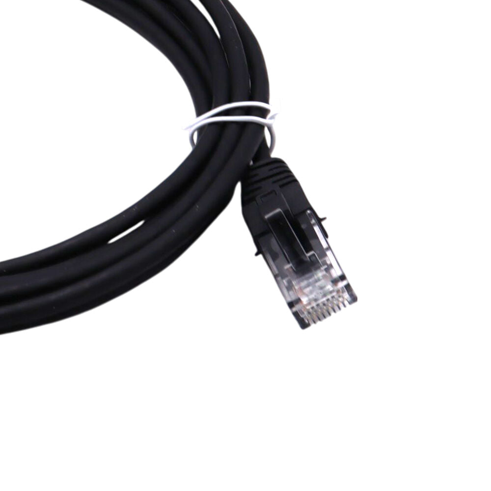 Close-up of black ethernet cable end showing the strain relief boot and RJ45 connector back