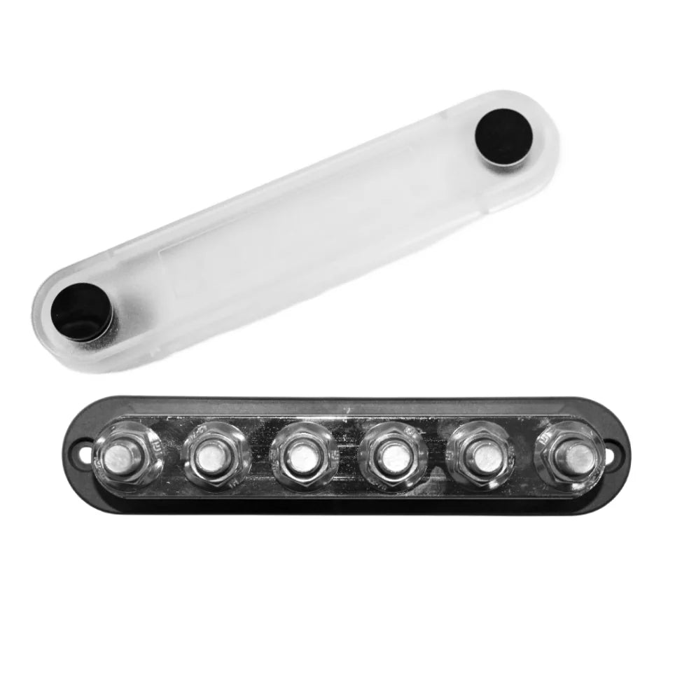 Overhead view of 6-stud busbar with clear cover removed showing nickel-plated terminals