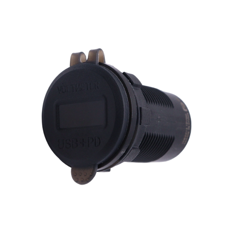 Closed translucent black dust cover on flush mount socket labeled Voltmeter and USB+PD