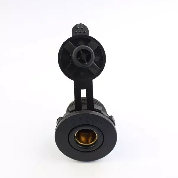 Front view of Exotronic Merit socket showing brass internal contacts and open protective cover