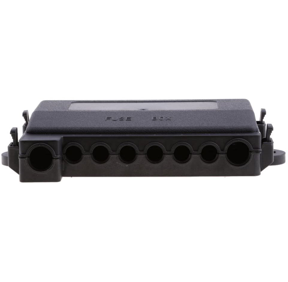 Side profile of fuse box showing cable entry holes and cover retention clips