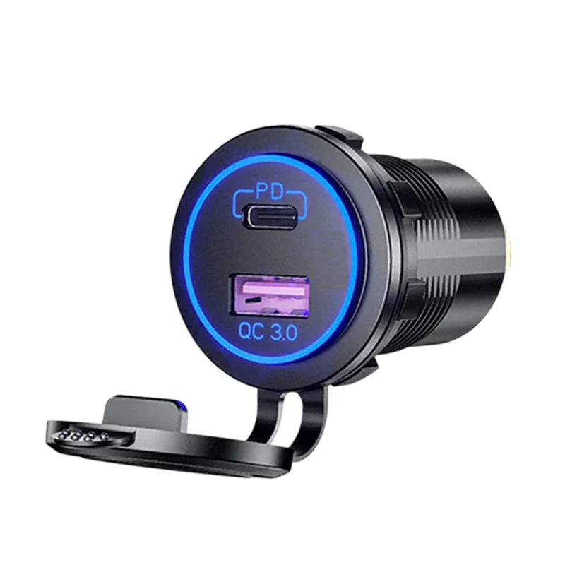 Angled view of flush mount socket with blue LED ring illuminated, open cap, USB-C and USB-A ports