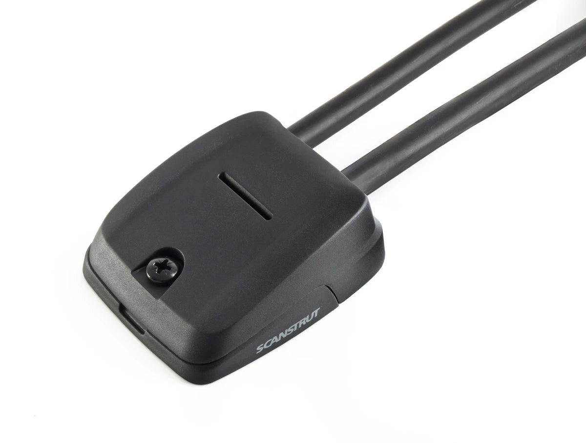 Black horizontal double cable seal installed with two cables passing through