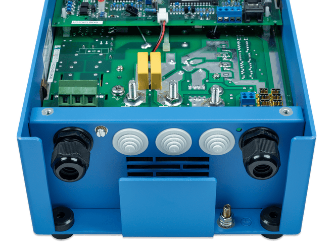 Internal component view of a Victron Phoenix 24V 25A charger showing PCB and terminals