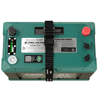 Overhead technical view of the battery showing terminals, SOC display, power button, and communication ports