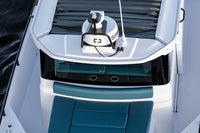 Scanstrut black cable seal installed on a boat roof near marine electronics