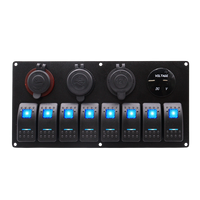 Front view of 8-gang marine switch panel with blue LED rockers, voltmeter, dual USB, and power sockets