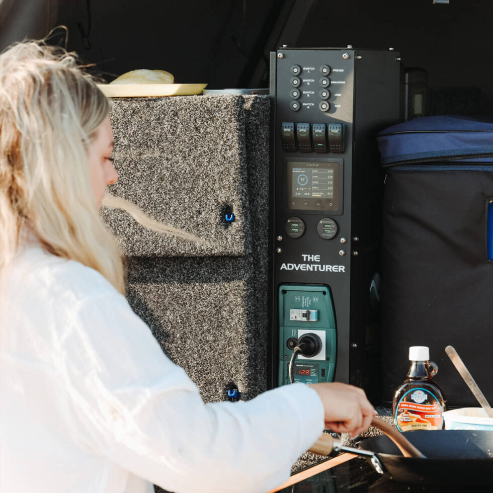 Portable power system being used to run an electric cooktop in a 4WD canopy setup