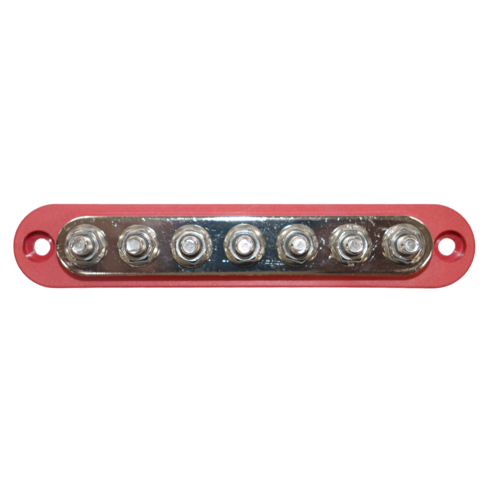 Overhead view of red busbar showing seven tin-plated copper studs and mounting holes